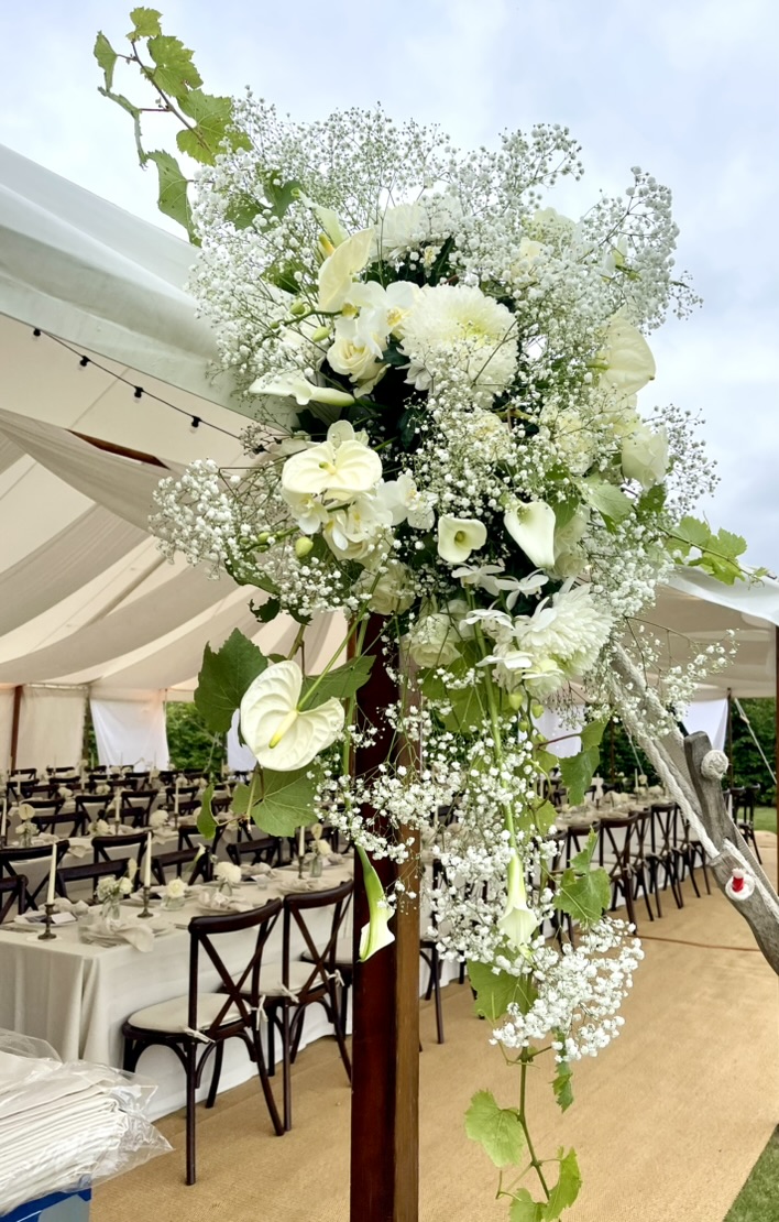 White orchid, anthurium and gypsophila wedding installation